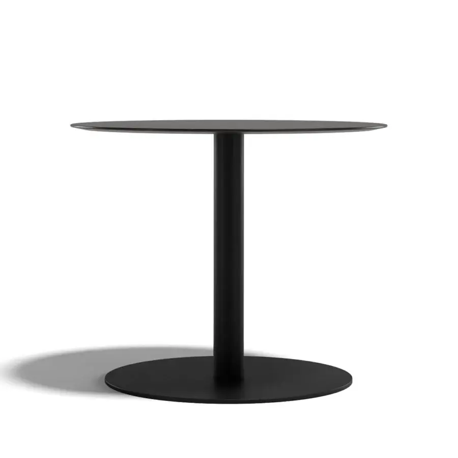 Superior Atmosphera Net table with sleek cylindrical form and durable matte black HPL tabletop built with galvanized steel
