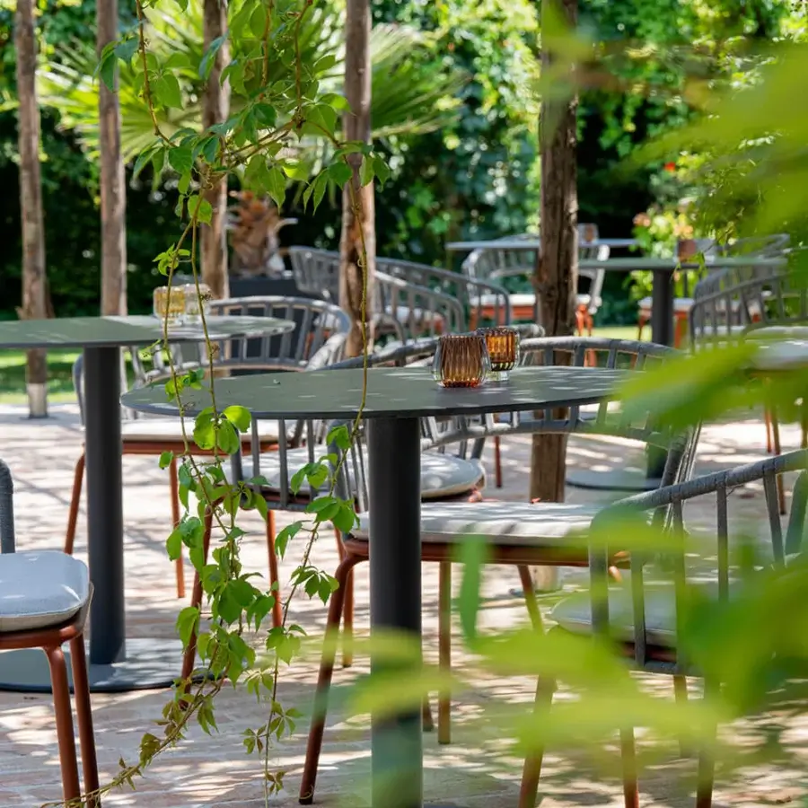 Distinguished Atmosphera Net R table with light gray HPL tabletop and dark gray galvanized steel base crafted in Italy