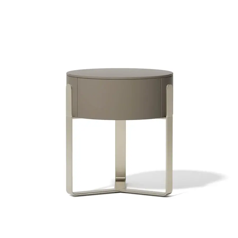 Refined Capital Aurea nightstand with circular design and sleek taupe metallic base built with matte lacquer finish