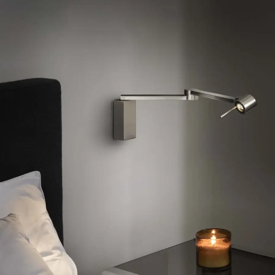 Elegant Contardi Manhattan wall lamp in muted gray with a smooth satin metal construction and adjustable arm