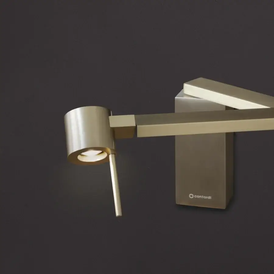 Exceptional Contardi Manhattan wall lamp crafted in Italy with satin metal and a warm golden tone