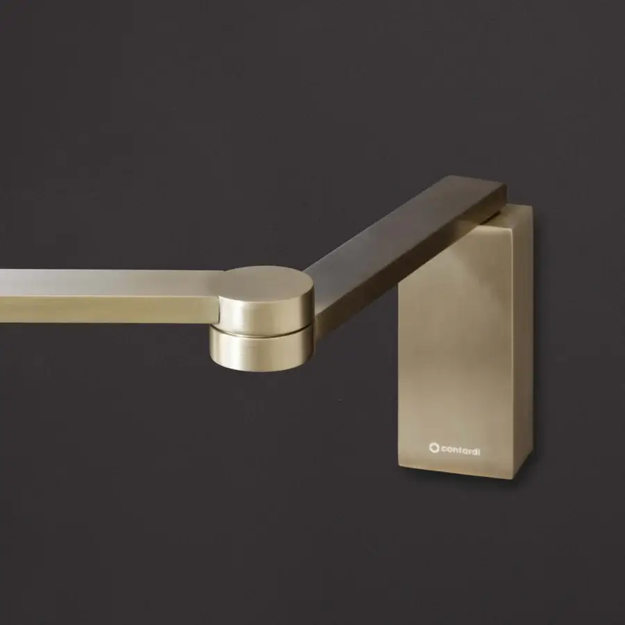 Elegant Contardi Manhattan wall lamp crafted in Italy with a satin metal finish and flexible double-jointed arm