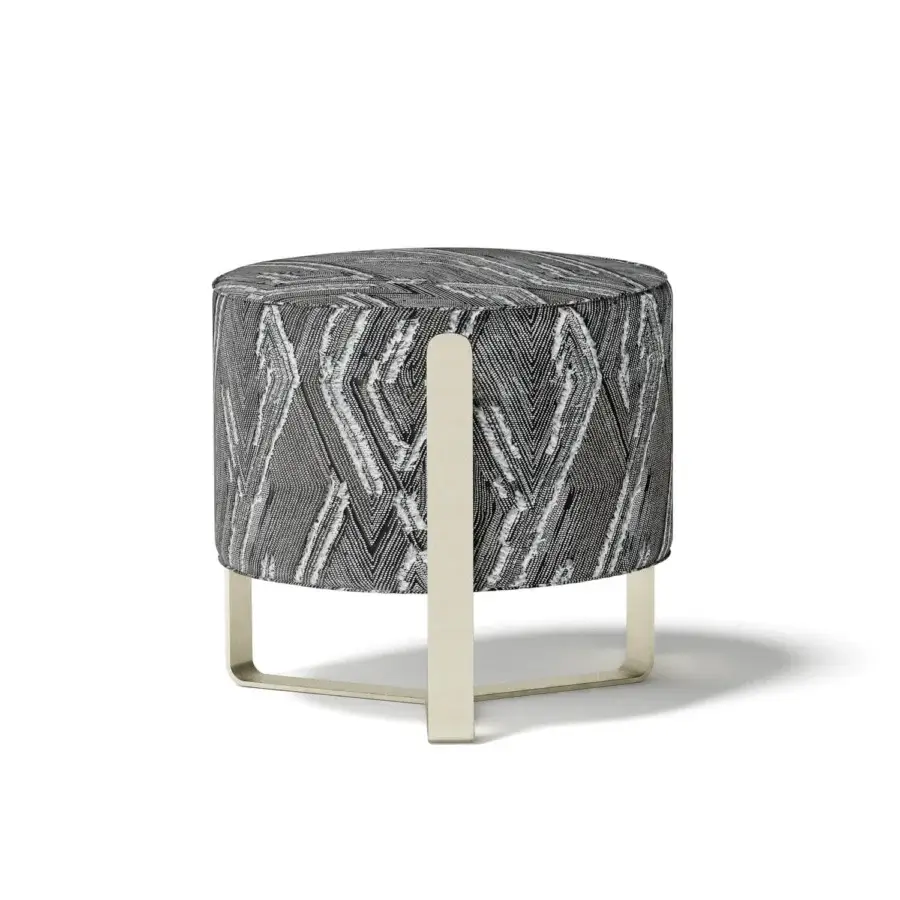 Distinguished Capital Aurea ottoman with textured gray and white patterned fabric and a sophisticated metallic base