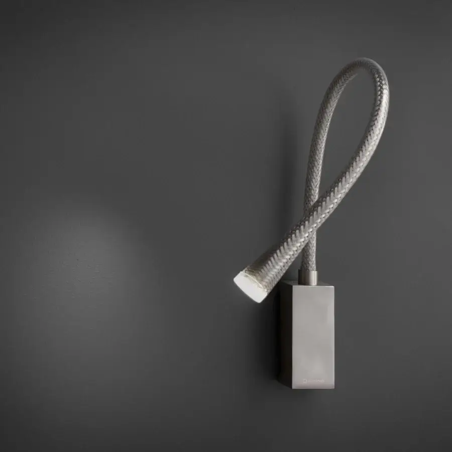 Superior Contardi Flexiled wall lamp with a flexible brass arm encased in steel mesh and transparent sheath, finished in dark gray