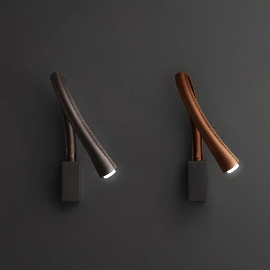 Elegant Contardi Flexiled wall lamp with a flexible arm crafted in dark brown leather and matte dark gray metal base