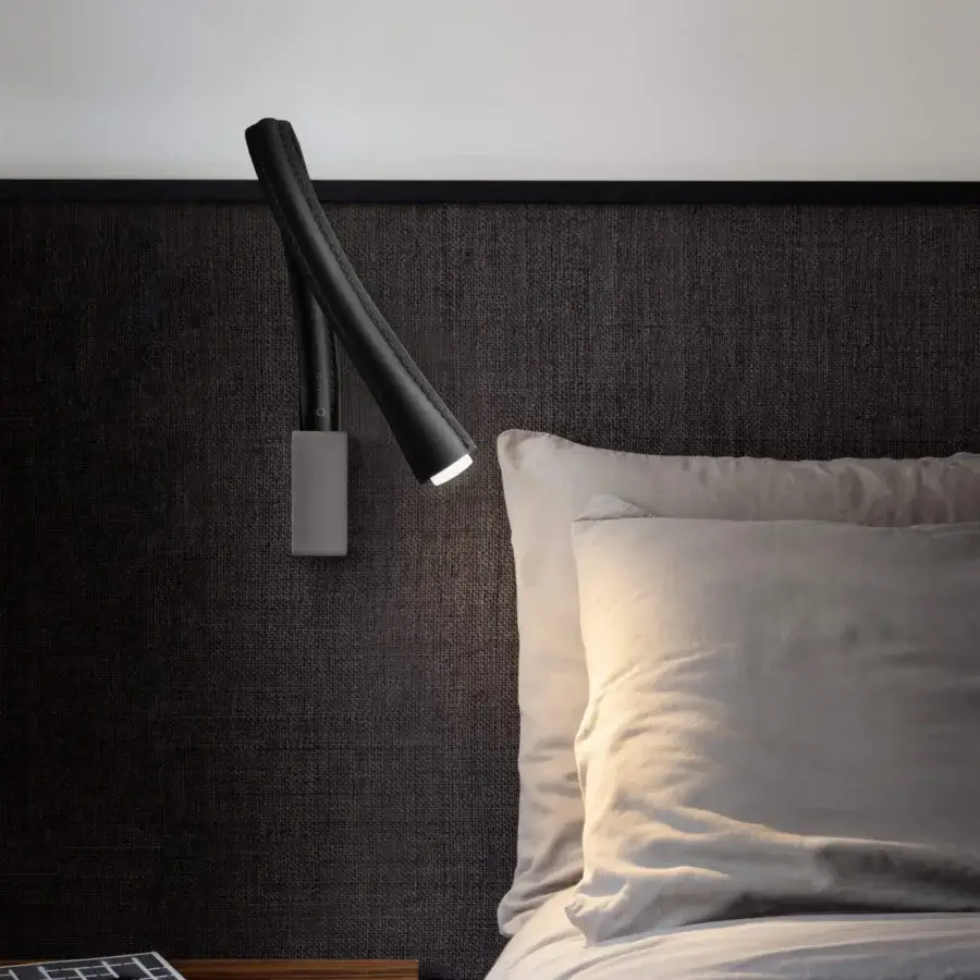 Elegant Contardi Flexiled wall lamp with a flexible brass arm encased in steel mesh with a matte black finish