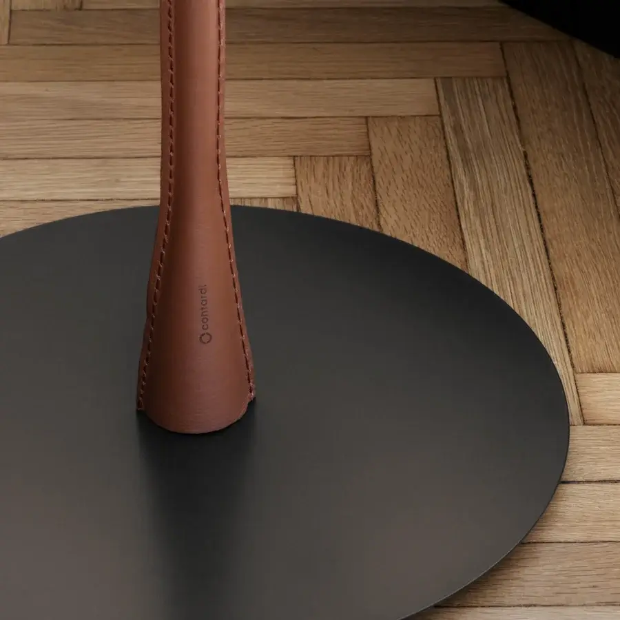 Distinguished Contardi Flexiled floor lamp with a brass arm and reddish-brown leather-like stem covering in a matte dark gray finish