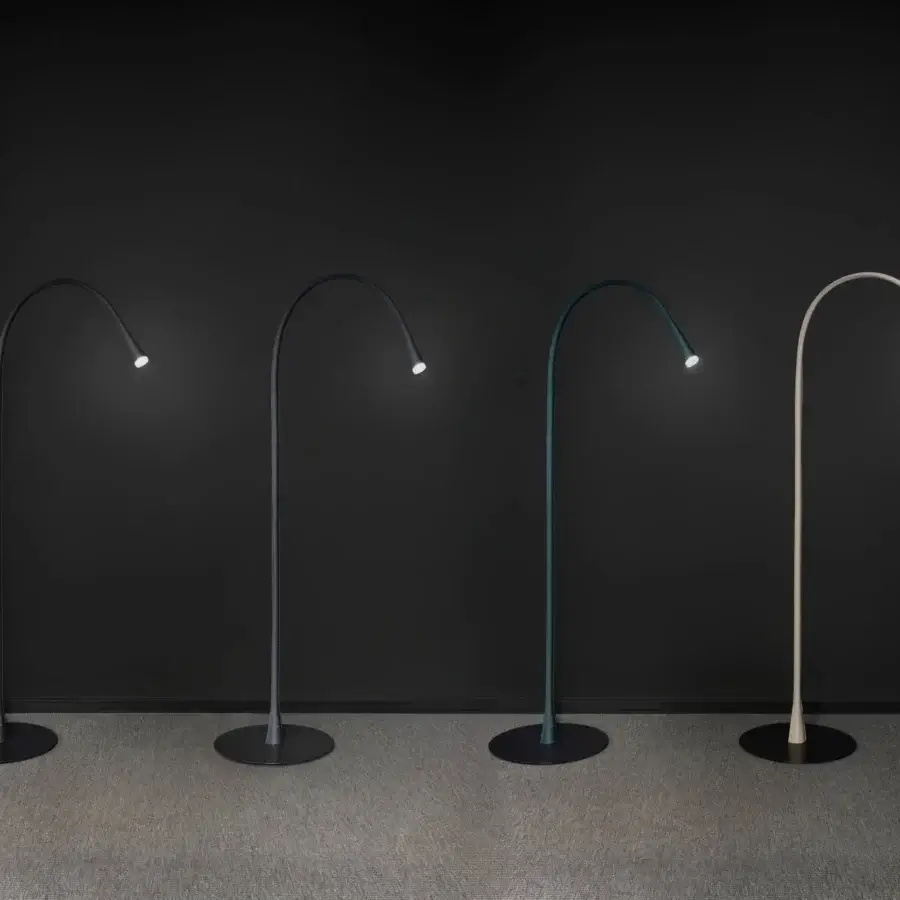 Superior Contardi Flexiled floor lamp crafted in brass with a sleek matte teal blue finish