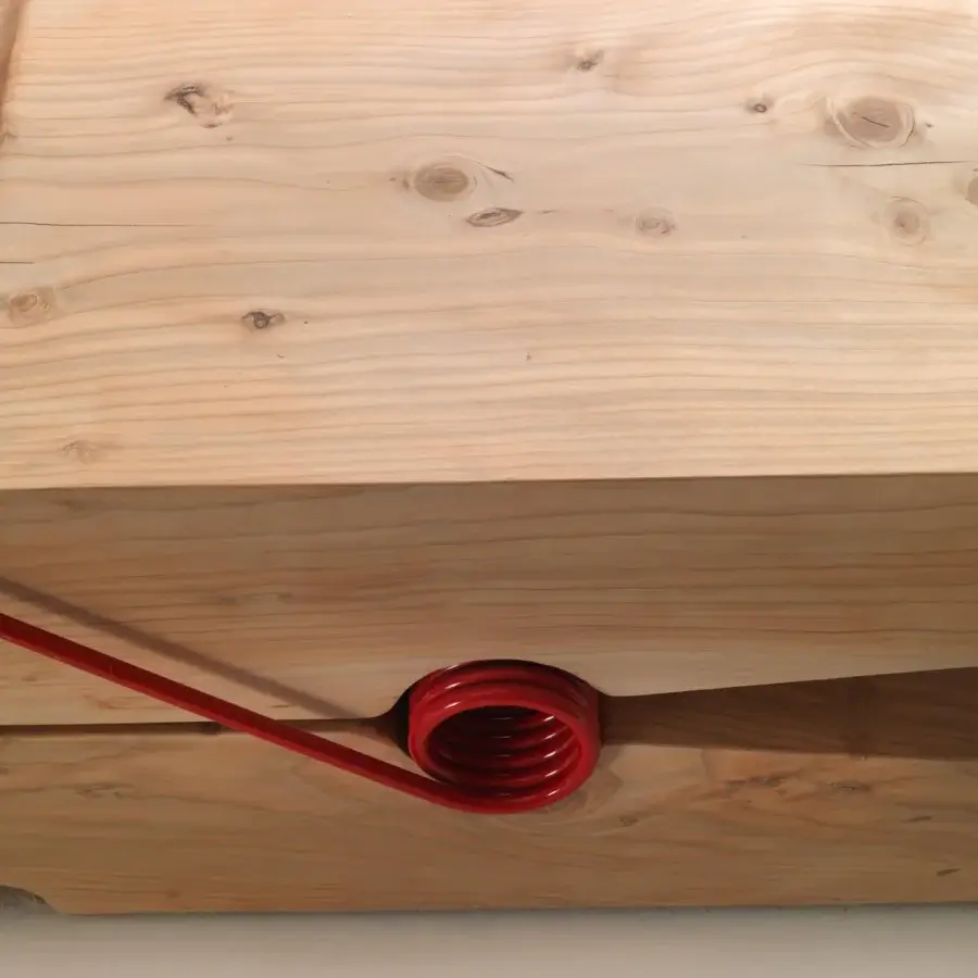Avant-garde Riva 1920 Molletta bench built in solid Lebanese cedar wood with a satin finish and striking red metal spring
