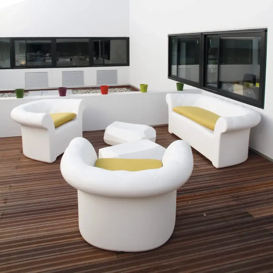 Distinguished Serralunga Sirchester sofa crafted from durable white LLDPE plastic with pale yellow cushions offering exceptional comfort