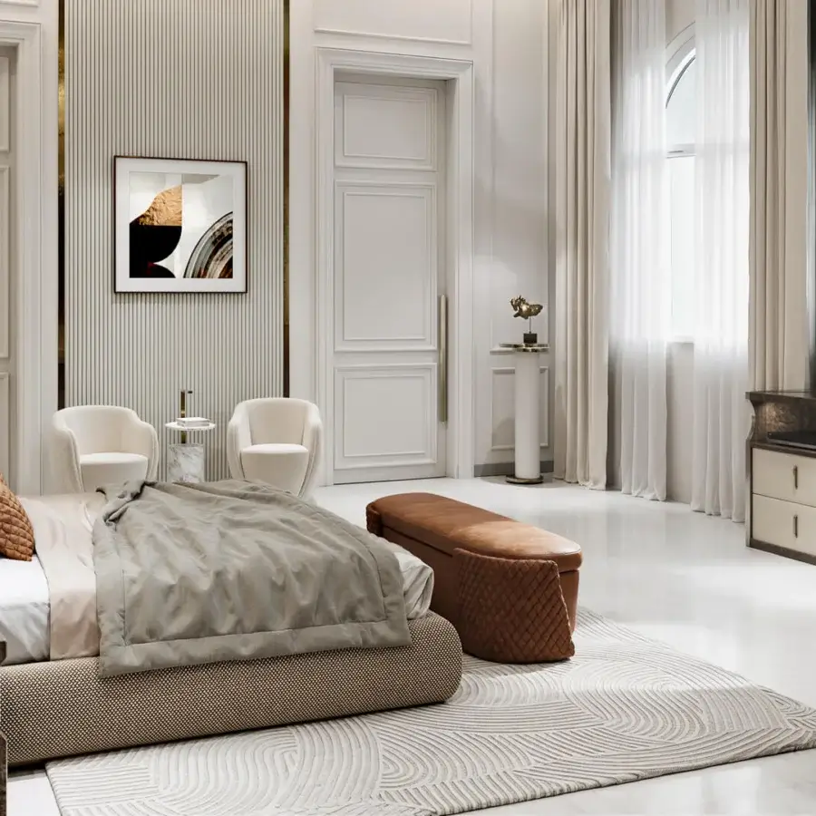 Elegant Capital Audrey lounge chair with gently curved lines and warm beige fine fabric upholstery with a refined metal plinth base