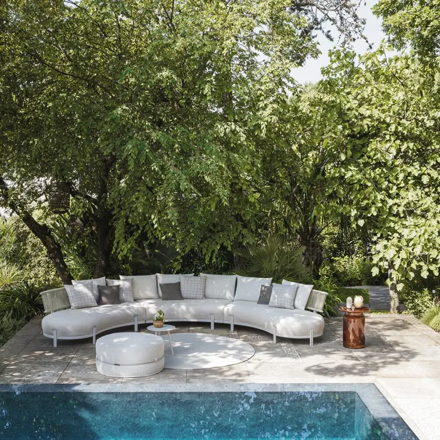 Superior Atmosphera Loto sectional with graceful curves, neutral beige textile upholstery and smooth matte finish