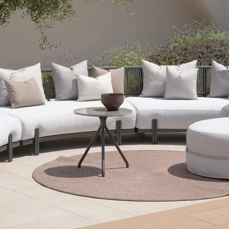 Distinguished Atmosphera Loto sectional with organically curved form built in textured light beige woven fabric and matte dark-toned metal frame