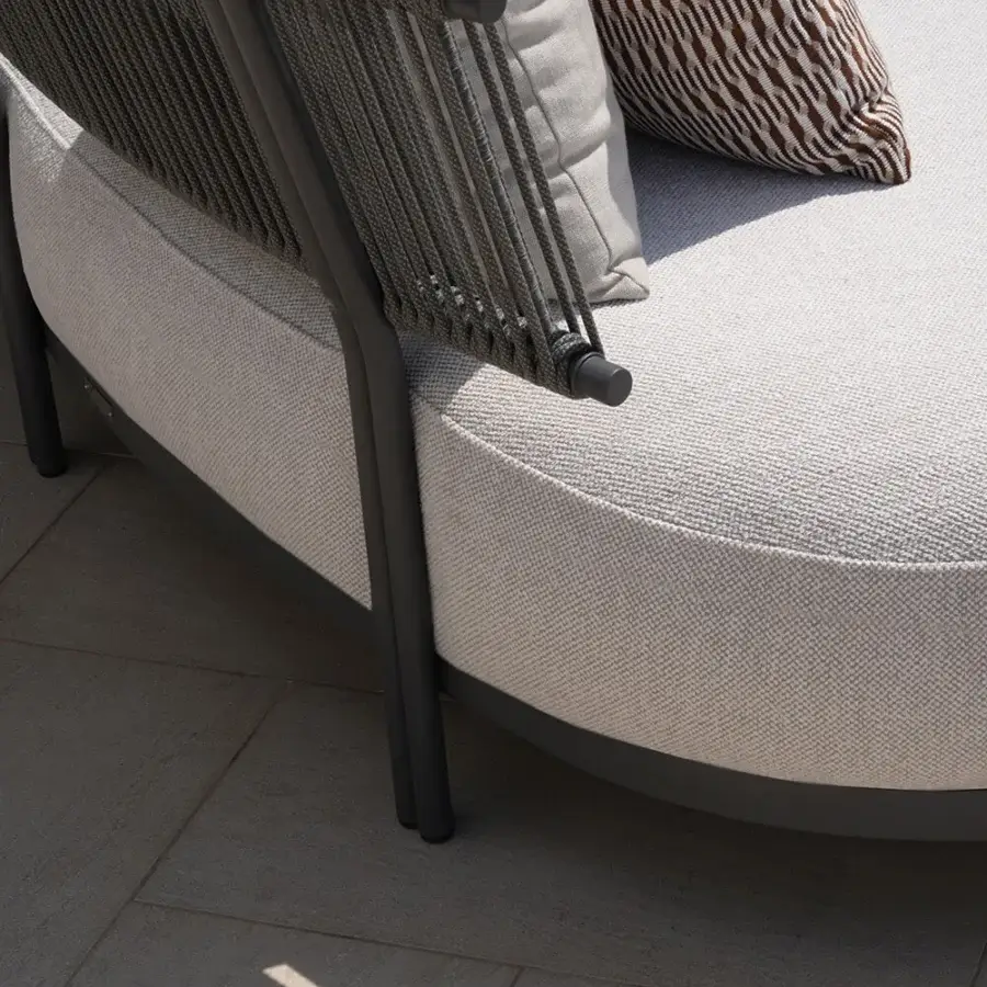 Superior Atmosphera Loto sectional with organically curved form crafted in light neutral textiles and woven cord detailing