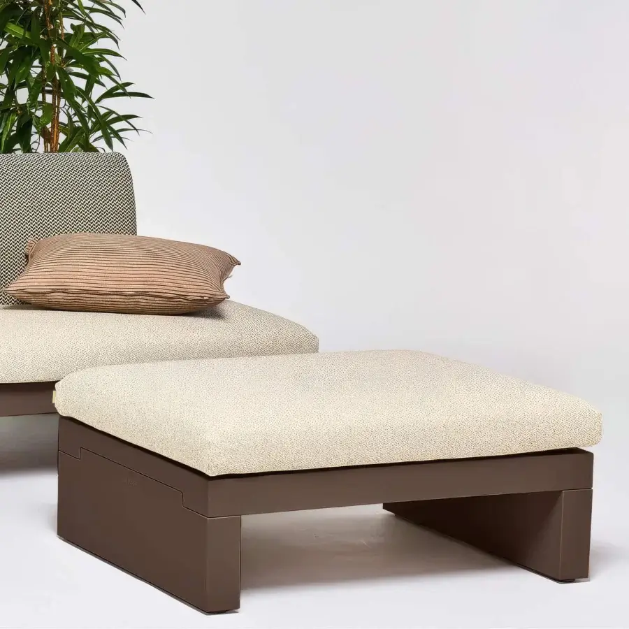 Distinguished Serralunga Riviera sofa crafted in textured neutral beige textile with a dark brown durable LLDPE base