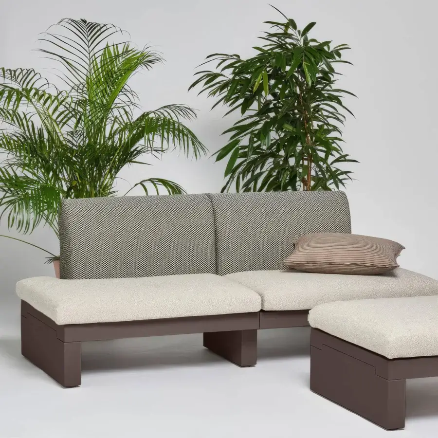 Superior Serralunga Riviera sofa crafted in speckled beige and gray cushions with a solid brown LLDPE base and matte finish