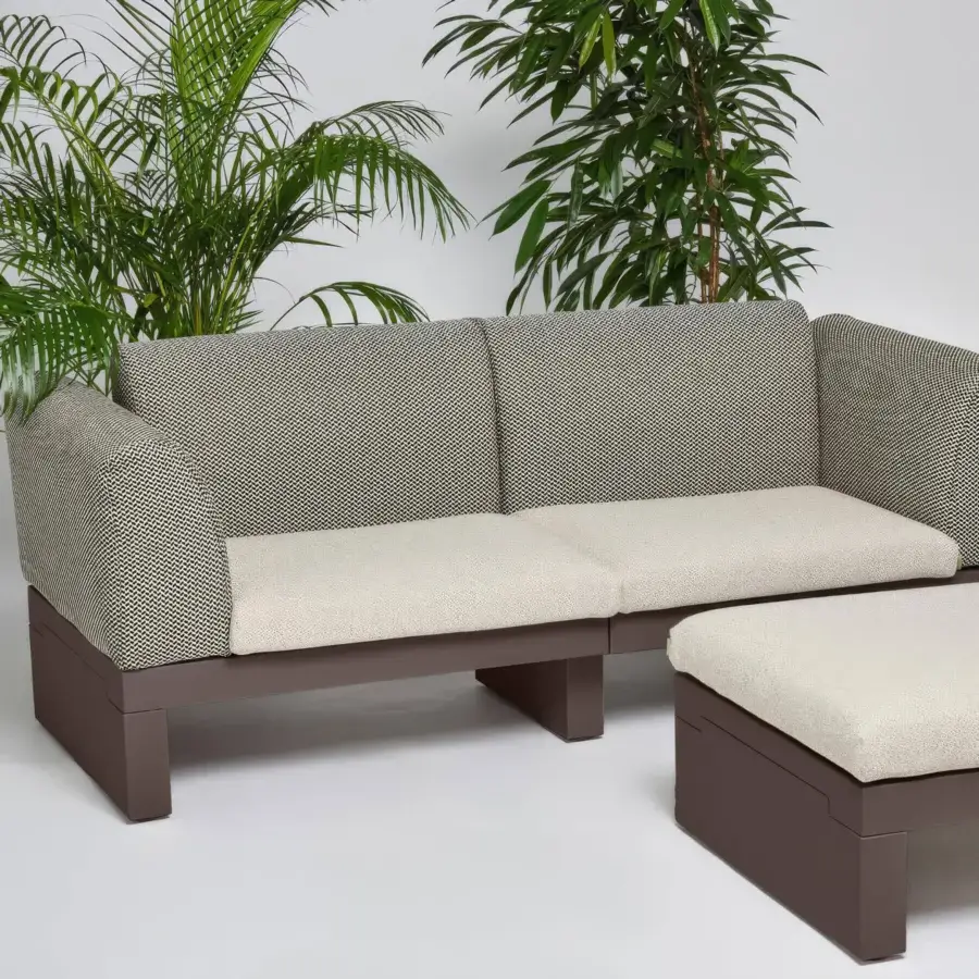 Exceptional Riviera sofa crafted in dark brown LLDPE with textured gray and beige patterned cushions and matte finish