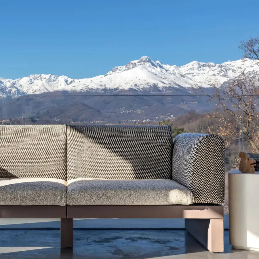 Exclusive Serralunga Riviera sofa crafted in muted gray textile with darker gray patterning and durable LLDPE material