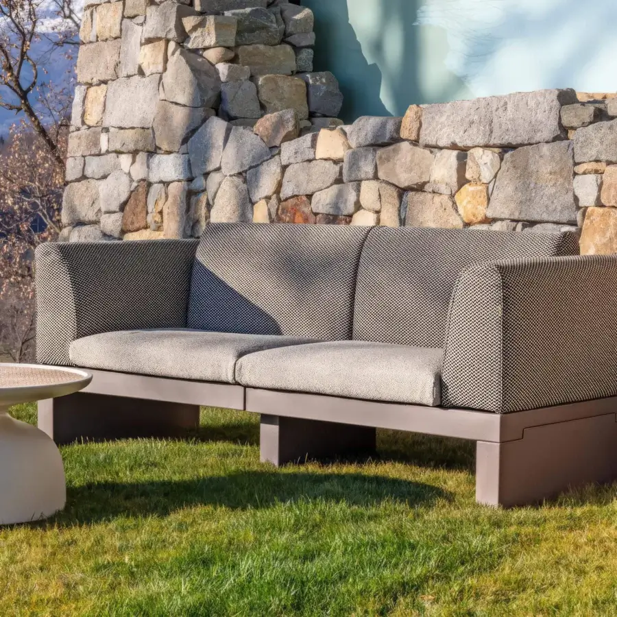 Sophisticated Serralunga Riviera sofa crafted in muted gray textile with durable LLDPE and matte finish