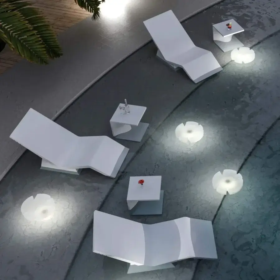 Innovative Serralunga Aquaplano side table crafted with recyclable plastic and a matte white finish