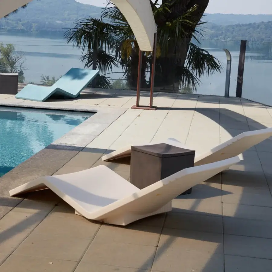 Captivating Serralunga Aqua Lounger crafted in off-white LLDPE with a smooth matte finish for balanced outdoor comfort