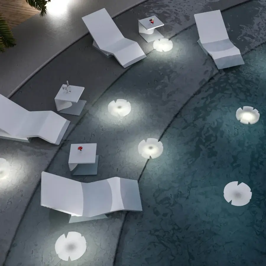 Innovative Serralunga Aqua Lounger lounger built in white recyclable LLDPE plastic with a smooth textured finish