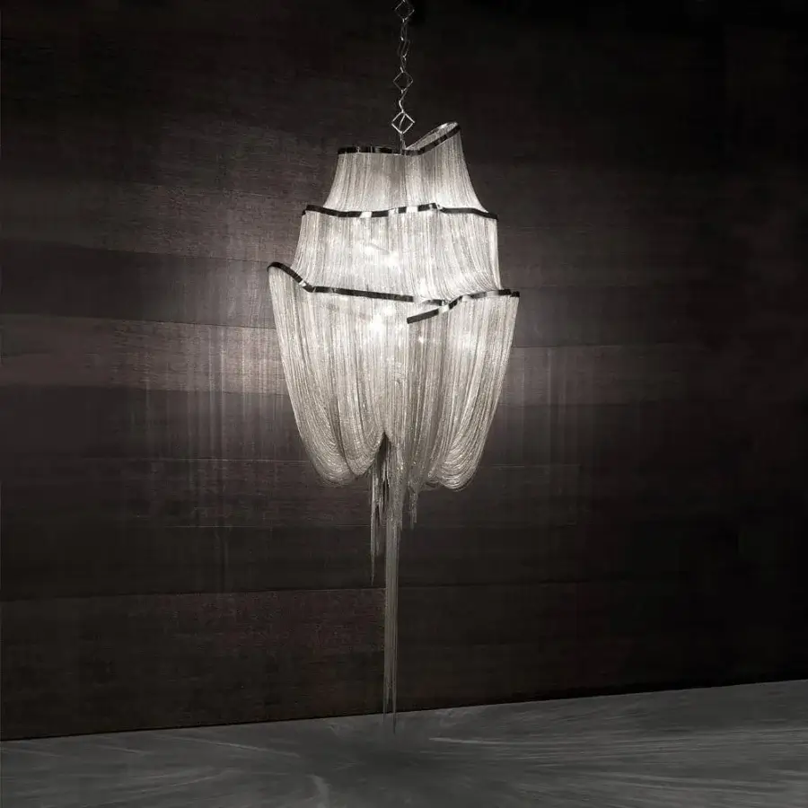 Lavish Terzani Atlantis suspension lamp crafted with nearly three miles of hand-draped brass chains in reflective silver tone