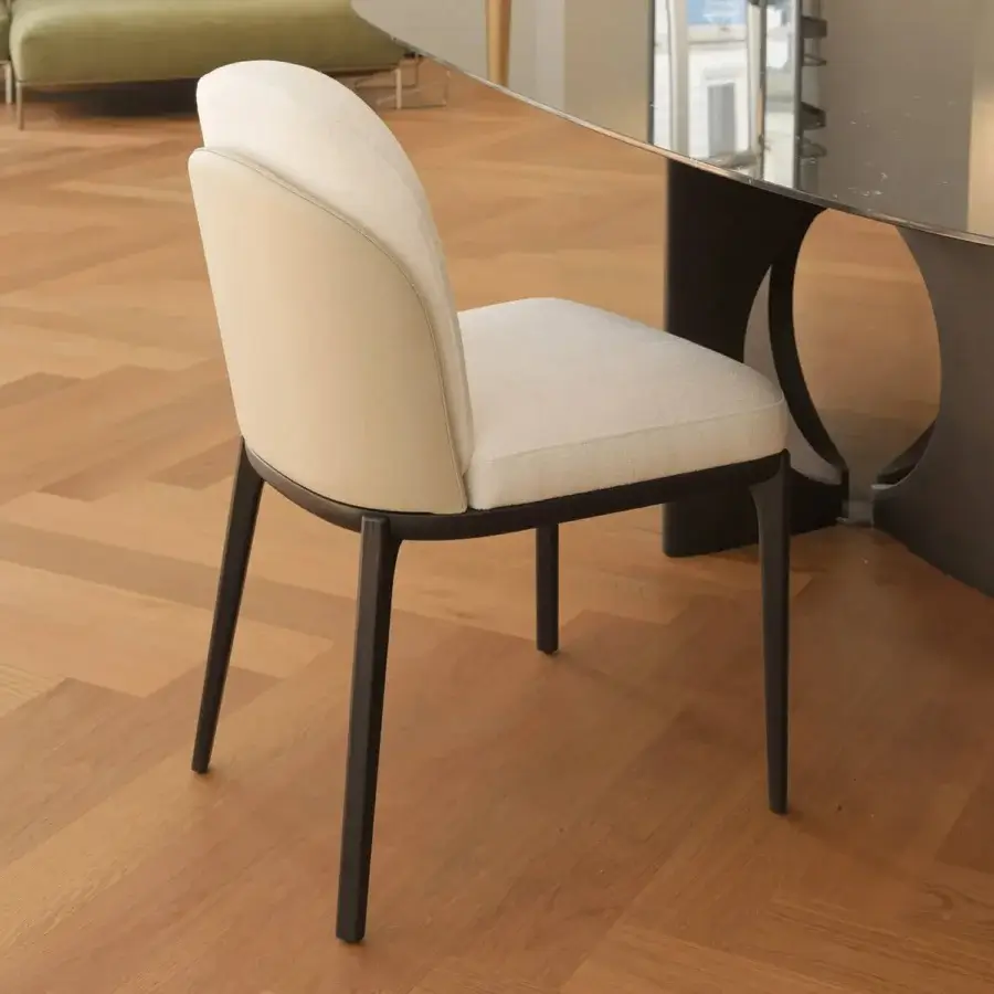 Distinguished Horm Piccadilly chair with light beige fabric upholstery, a solid wood structure and dark-toned matte metal frame