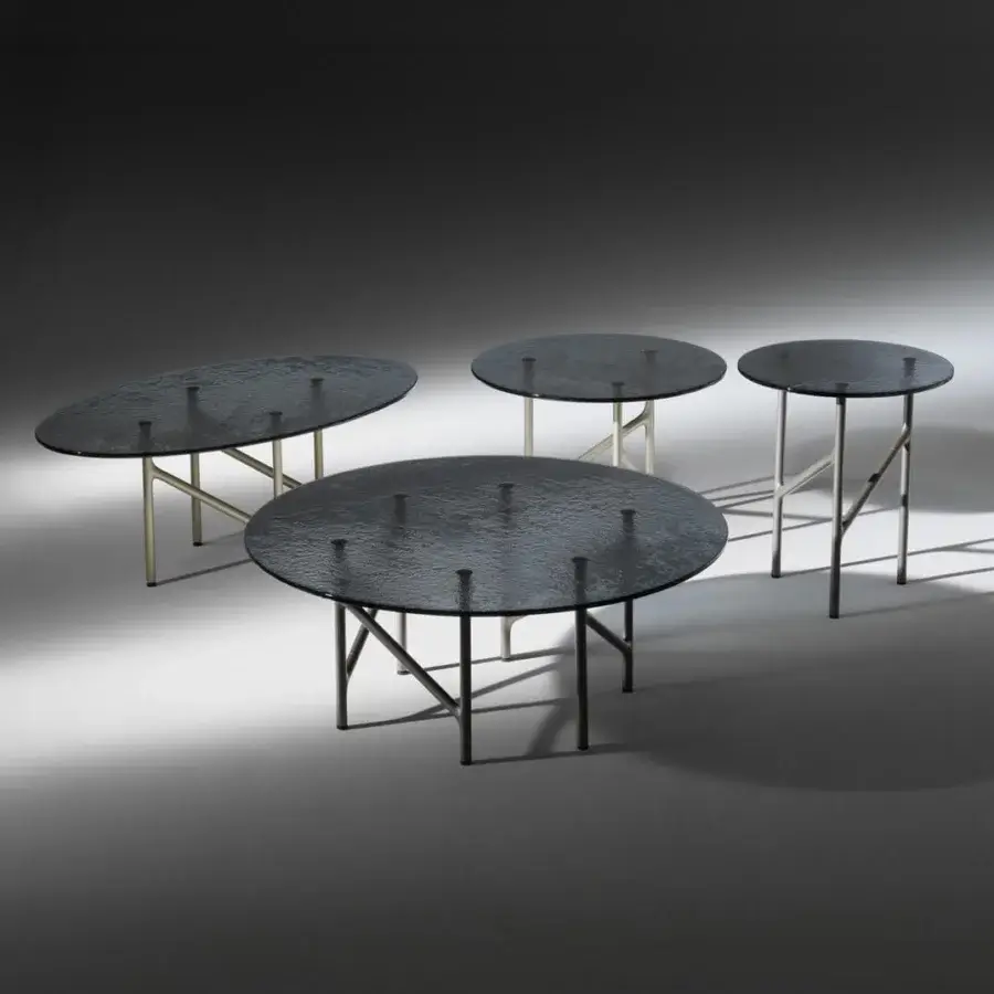 Superior Horm Alexander coffee table with a hammered glass top and lightweight metal base in dark gray tones