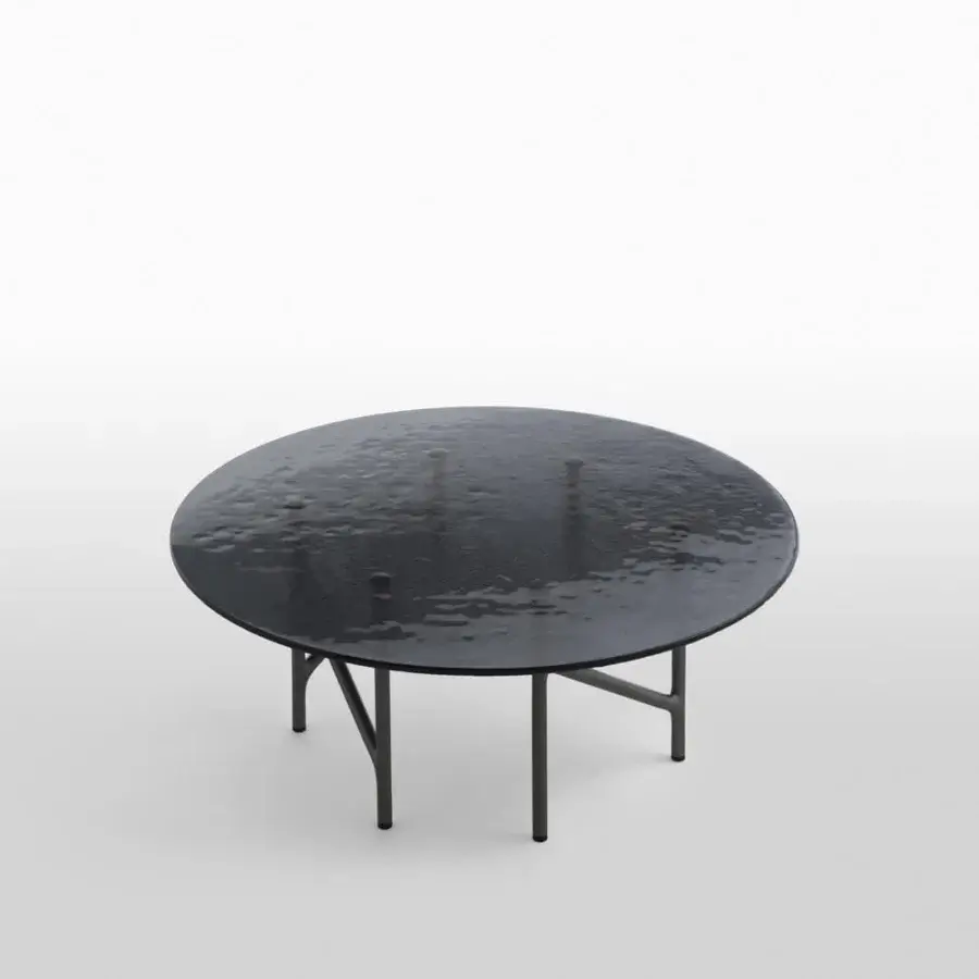 Exceptional Horm Alexander coffee table with a darkly-toned hammered glass top and refined metal base crafted for balanced beauty