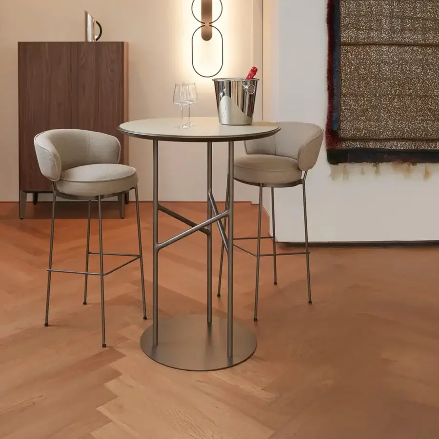 Captivating Horm Vendome stool upholstered in light beige textile with a muted gray matte metal frame