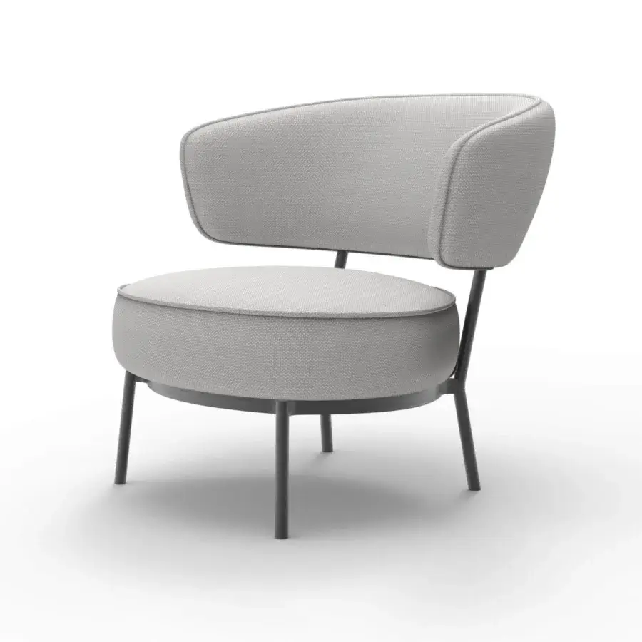 Distinguished Horm Vendome lounge chair with rounded form and light gray textile upholstery supported by a slender metal frame with wood accents