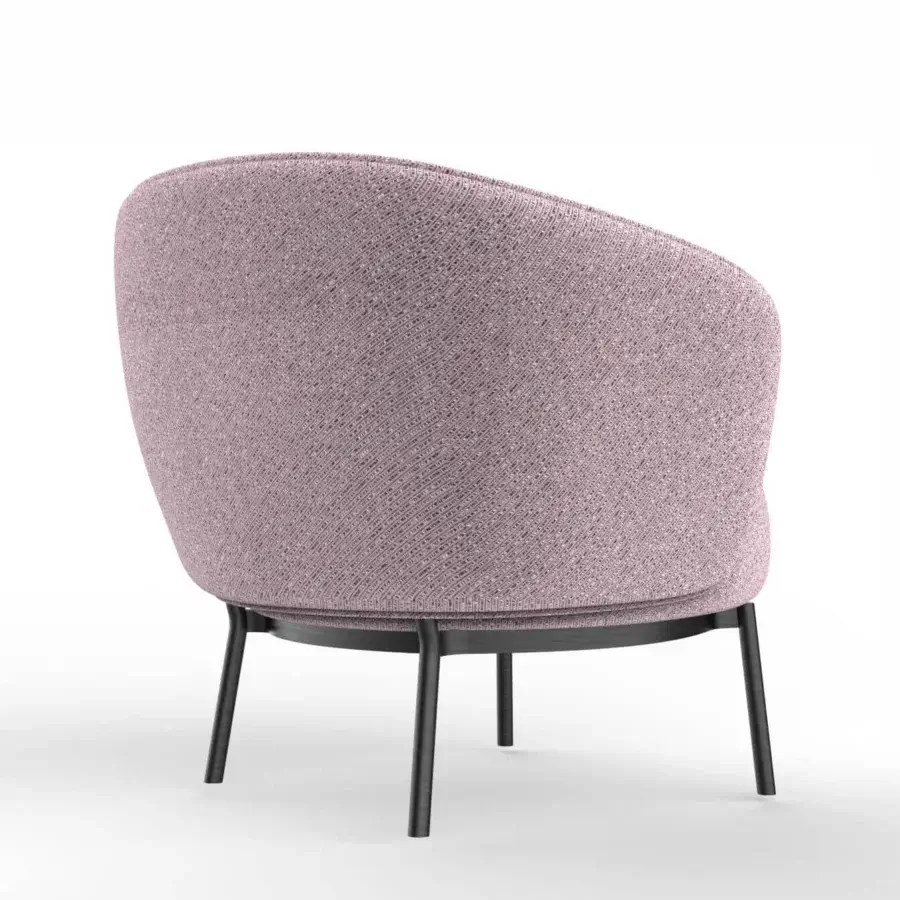 Superior Horm Concorde lounge chair with enveloping comfort, muted rose textile upholstery and slender dark-toned metal legs
