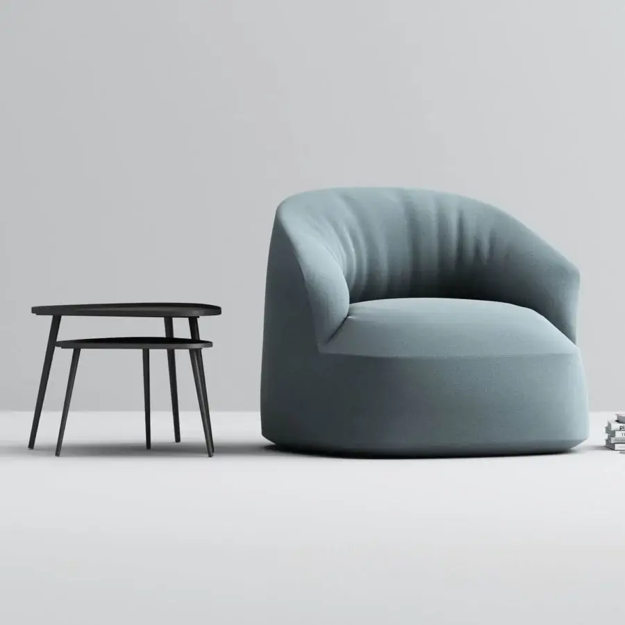 Distinguished Horm Edith swivel lounge chair with organically rounded form upholstered in textured blue-grey textile material crafted by Studio Pastina