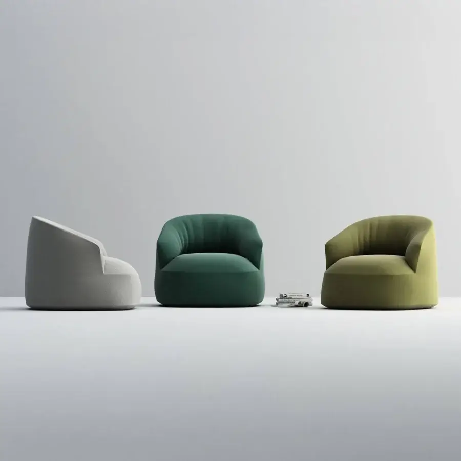 Superior Horm Edith swivel lounge chair with enveloping organically rounded form upholstered in deep forest green textile