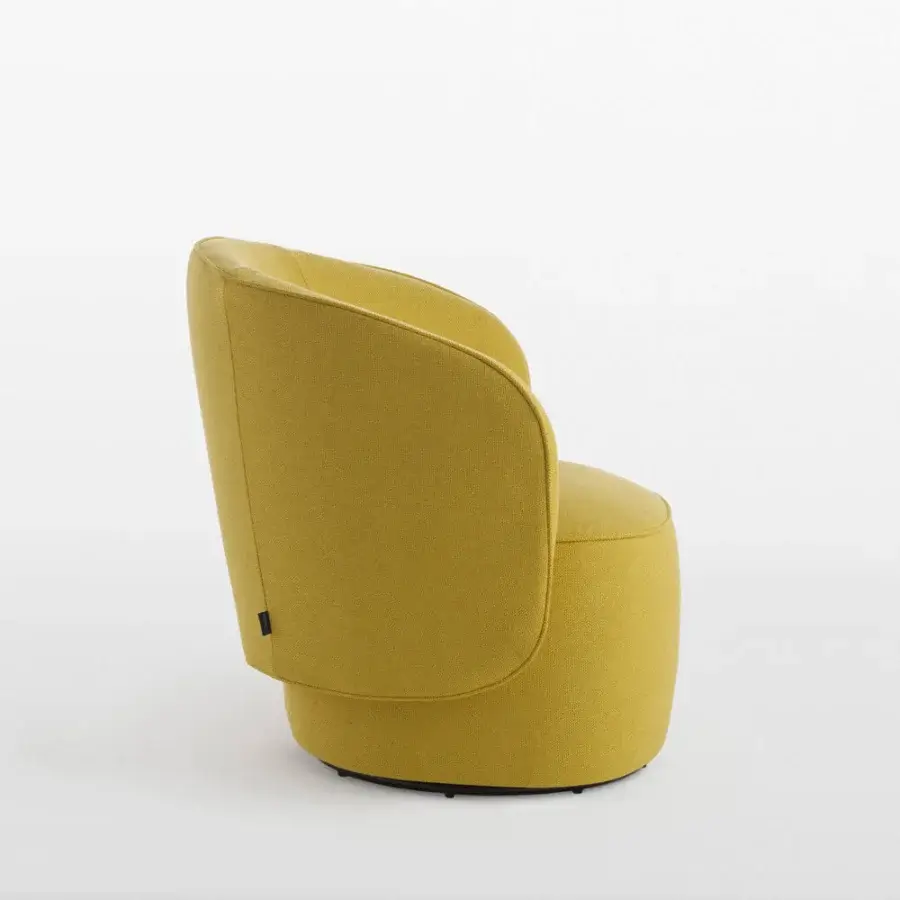 Elegant Horm Étoile swivel lounge chair upholstered in textured golden yellow textile with a smooth dark swivel base