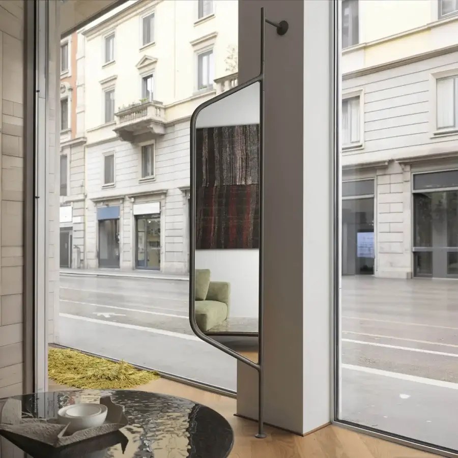 Distinguished Horm Bebel mirror with slender painted metal structure and integrated shelves embodies Italian savoir-faire in a matte dark finish