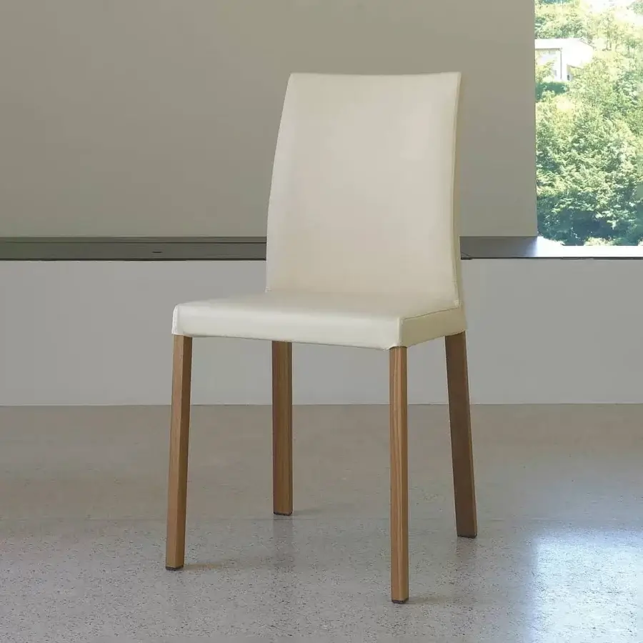 Distinguished Ivano Antonello Italia Barby dining chair upholstered in off-white textile with satin-finish brown wood legs