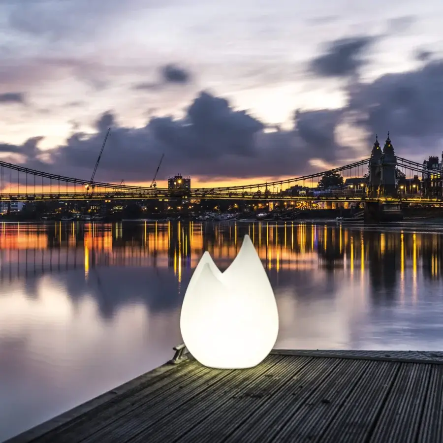 Distinguished Serralunga Flame floor lamp sculpted from bright white LLDPE with a matte finish and gently curved form