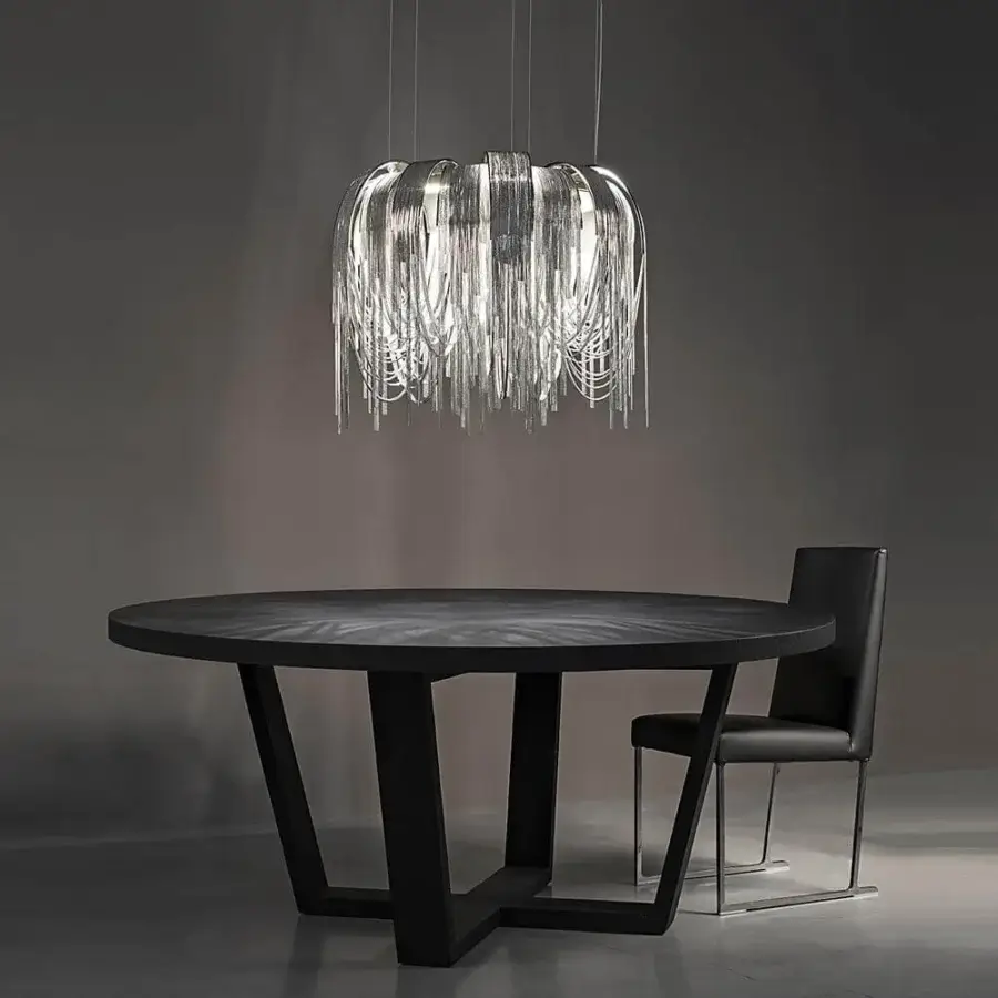 Elegant Terzani Volver suspension lamp crafted in cascading brass chains with a highly polished silver finish