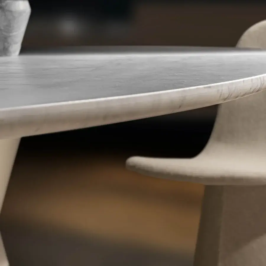 Remarkable Lago Chapeau oval table in light gray stone-like matte finish with sculptural pedestal and cantilevered edge