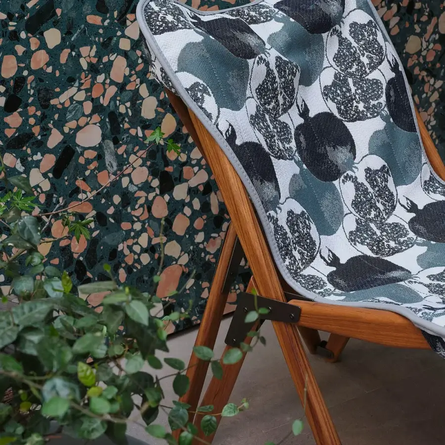Impeccable Giorgetti Alisea Tripolina chair with solid teak wood, stainless steel, leather and teal grey black botanical seat