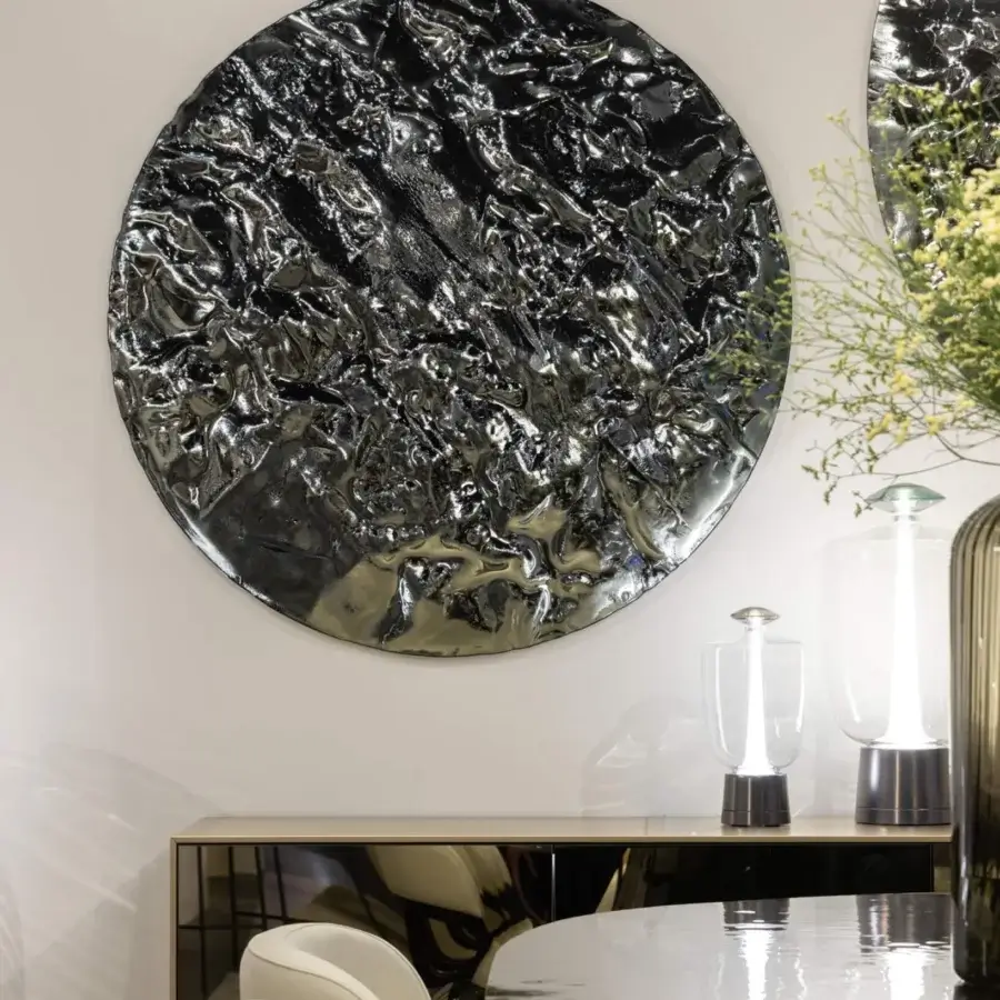 Luxury Tonin Casa Gong wall element in charcoal glass with reflective silver highlights, circular form organic texture artwork