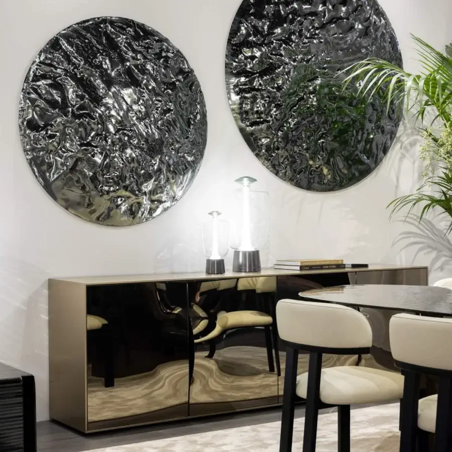 Sophisticated Tonin Casa Gong sideboard with mute gold frame and dark high‑gloss mirrored panels in contemporary design