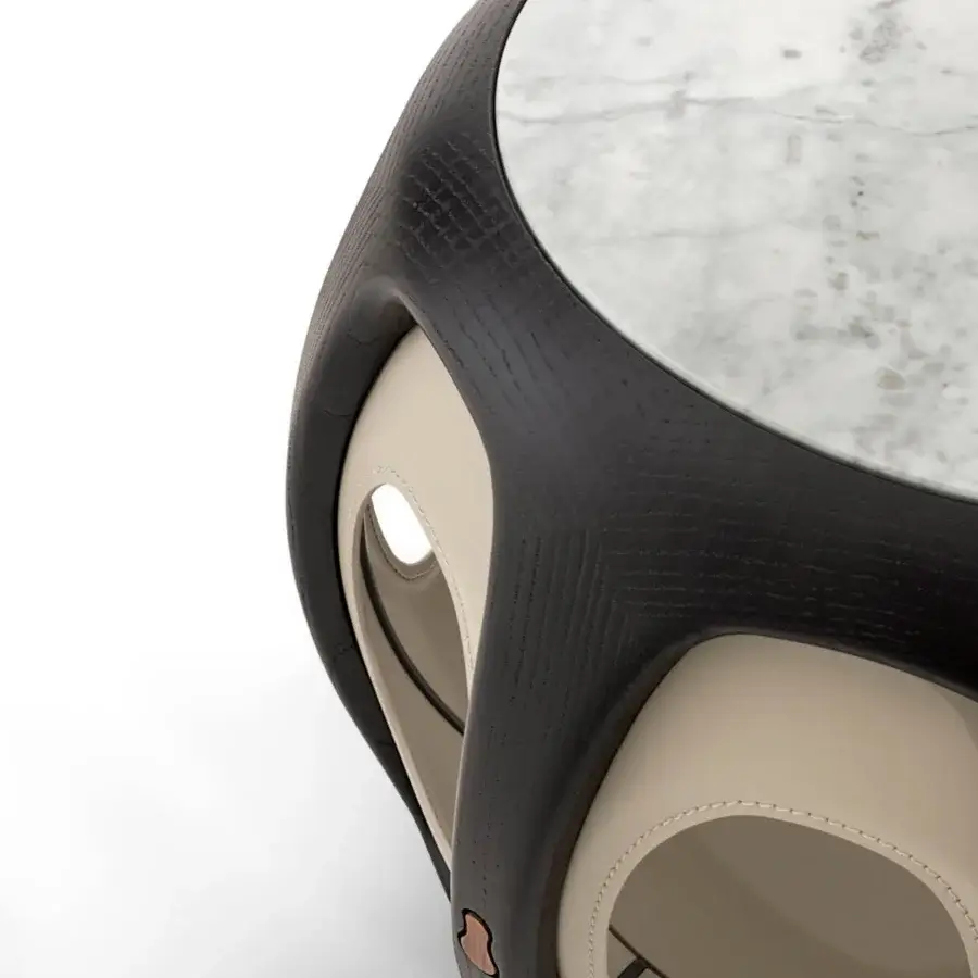 Luxury Giorgetti Yuan side table with polished white marble top, dark ashwood base in matte textured finish and fixed‑finish cream leather interior stitching
