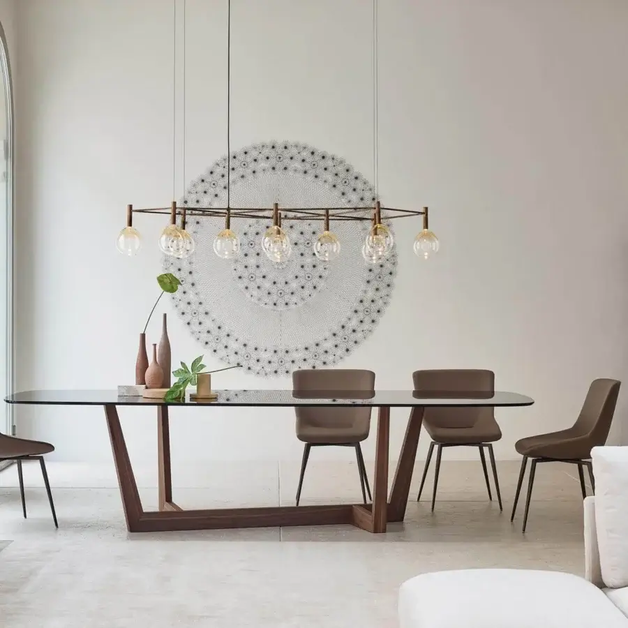 Elegant Bonaldo Art Wood table with a refined transparent glass top and solid American walnut wood base