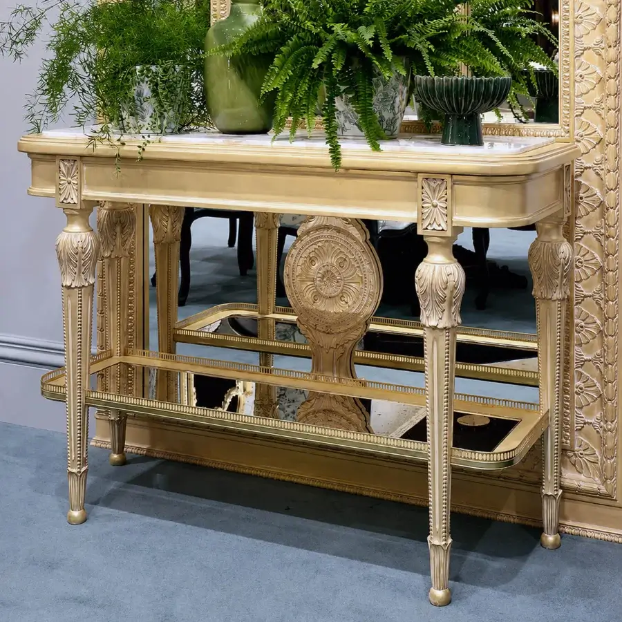 Luxury Bellotti Ezio console with gold leaf, Calacatta Gold marble top, mirror lower shelf, carved floral rosette motifs
