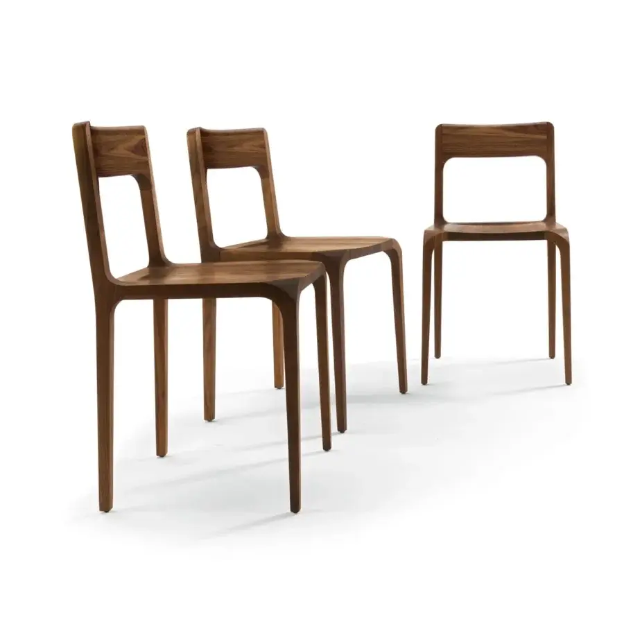 Luxury Riva 1920 Sleek Chair with solid wood, medium‑to‑dark brown satin finish, fluid tapered silhouette, frosted backrest, slender legs