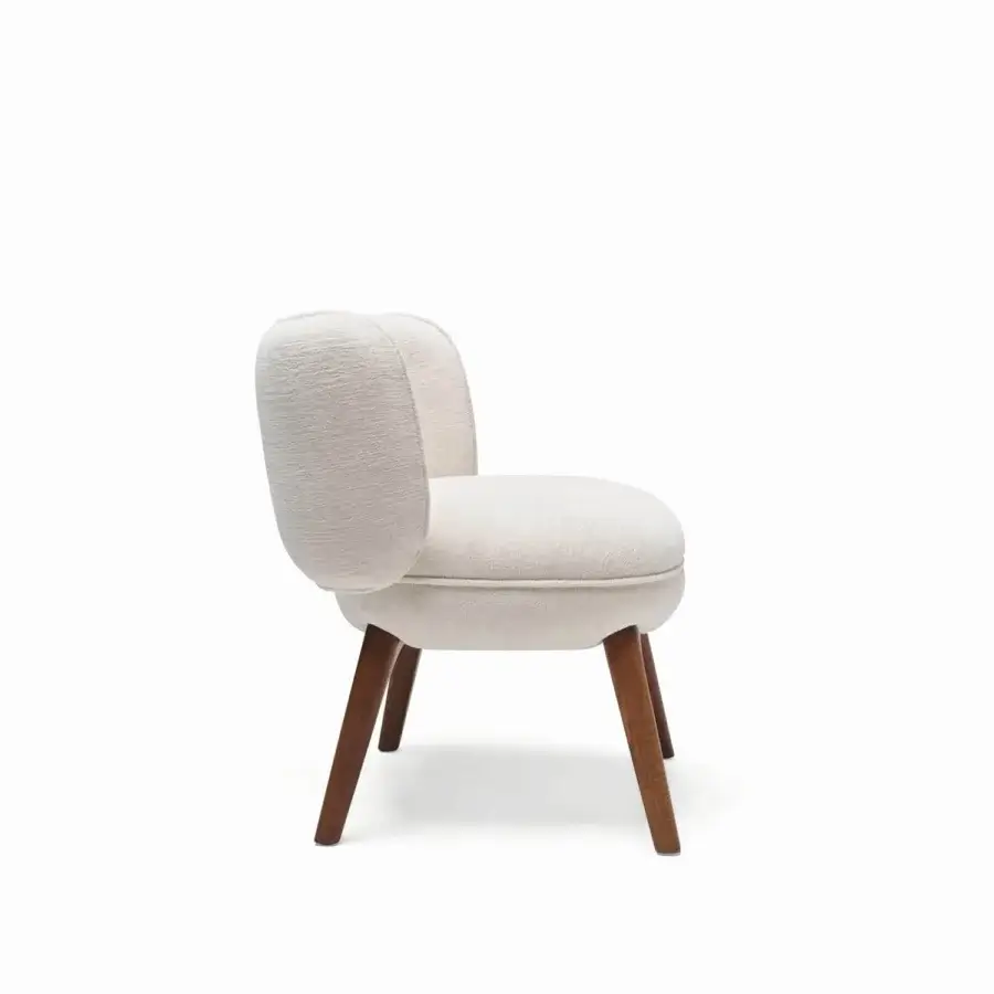 Sophisticated Visionnaire Fantino chair with off‑white bouclé‑style seat and backrest, stained ash legs tapering outward