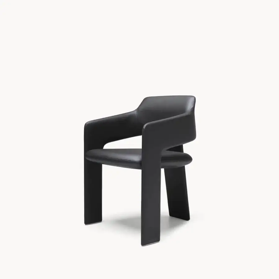 Luxury Visionnaire Rochester Armchair black leather‑like upholstery satin sheen folding into wide armrests and vertical legs